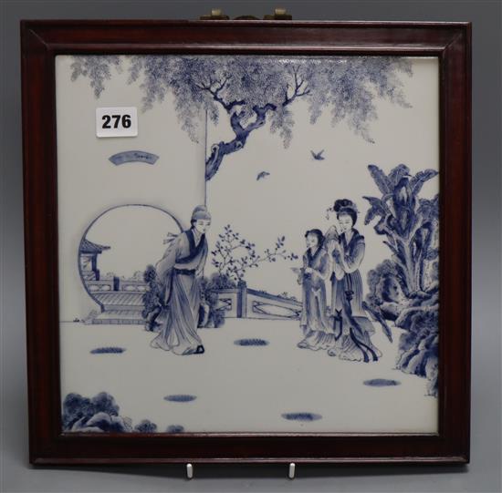A Chinese blue and white porcelain plaque, framed 29cm squared excluding frame